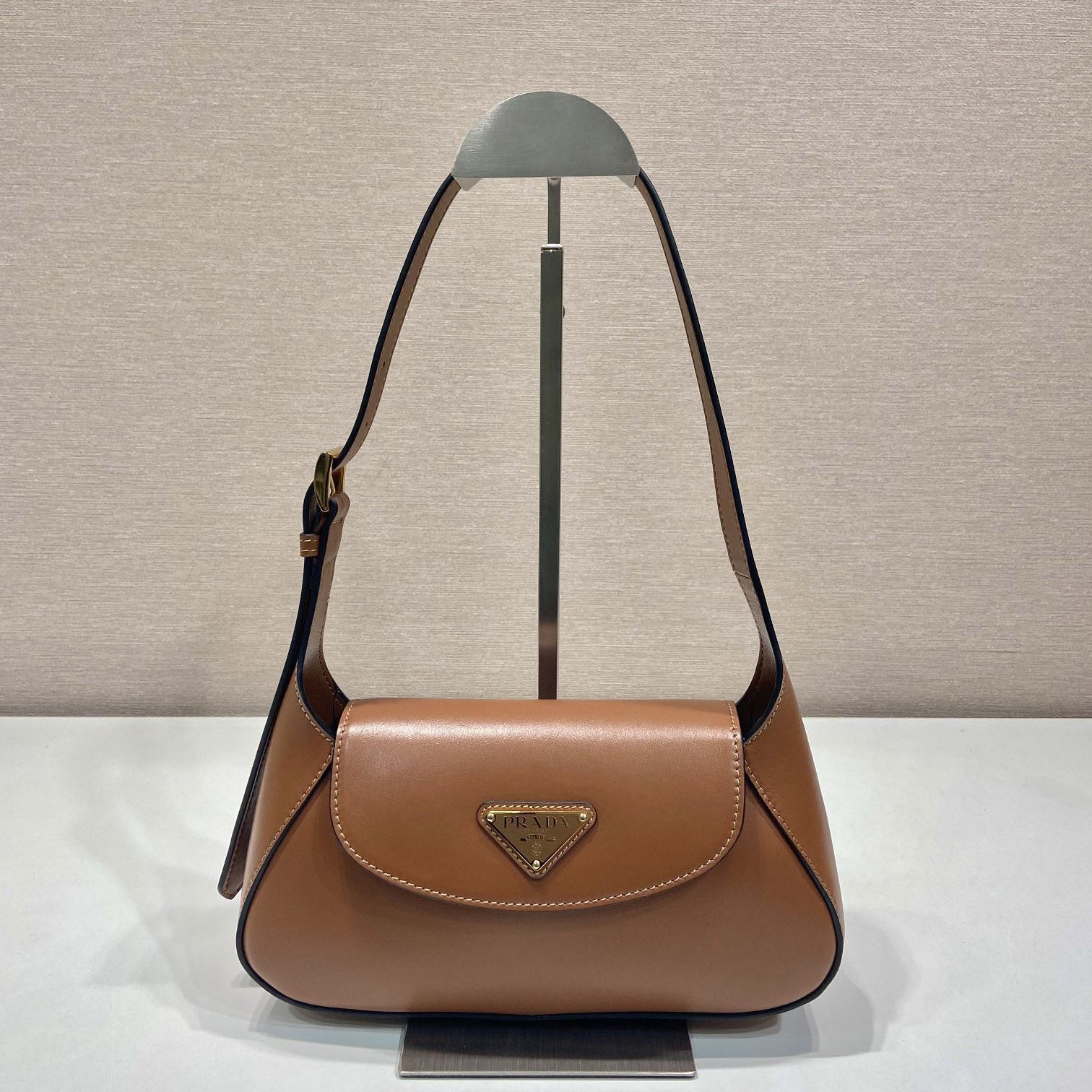 Pra*a top handle bags